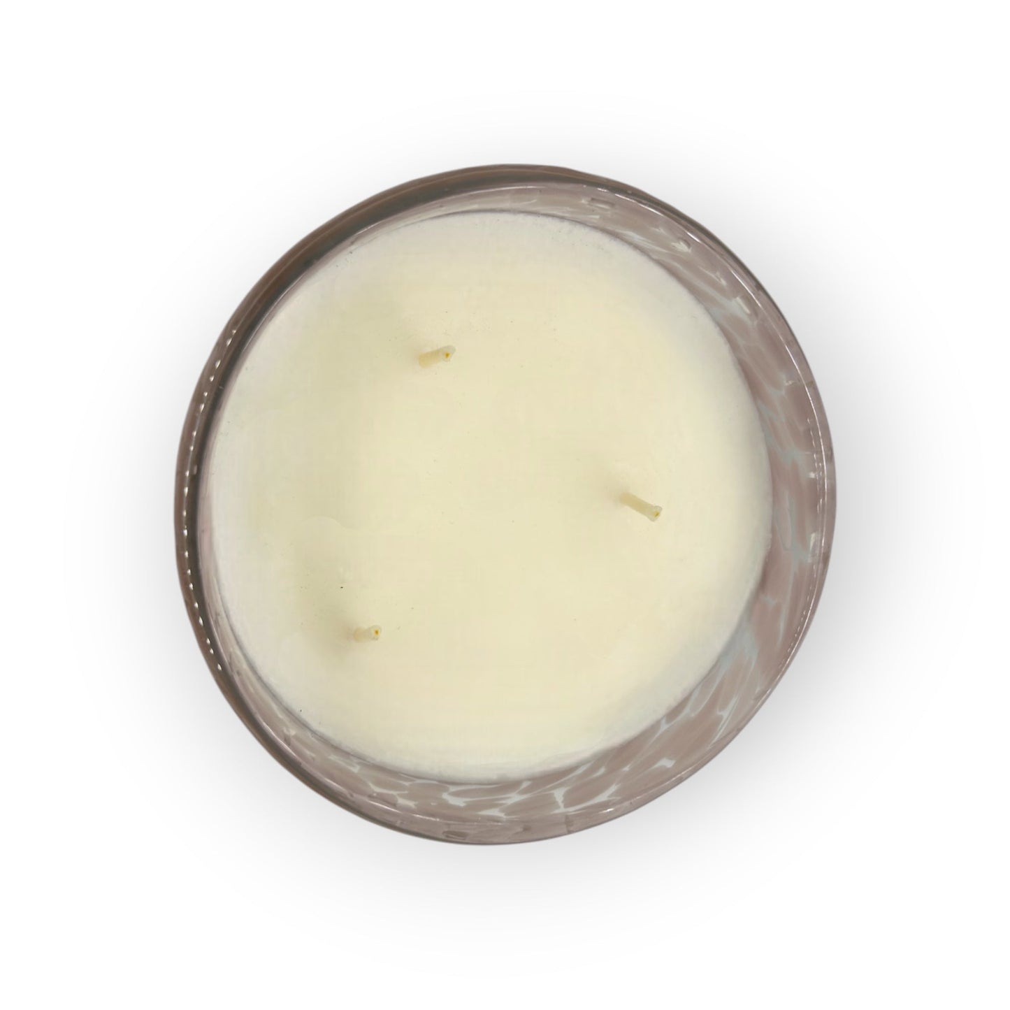 Candle in a glass jar with a decorative lid on a white background