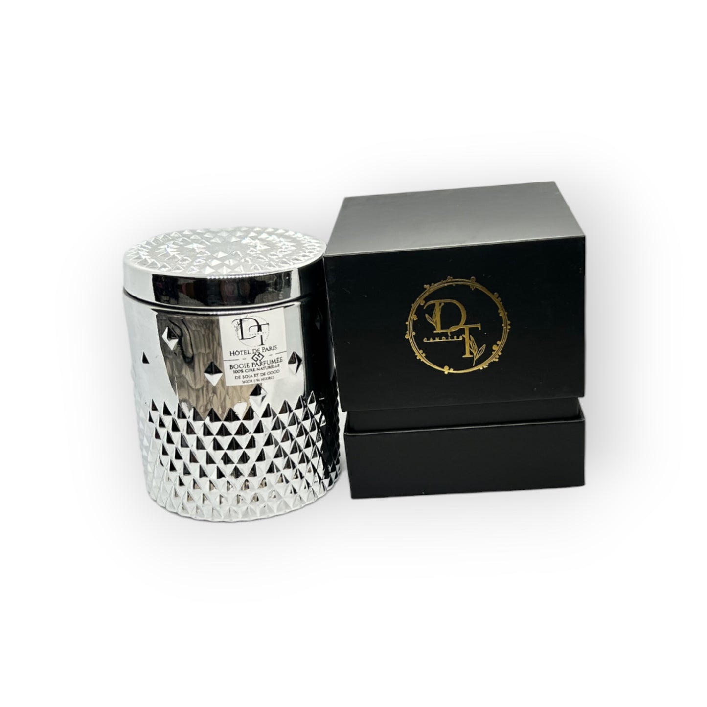 Decorative candle with textured design and black box featuring a logo on a white background