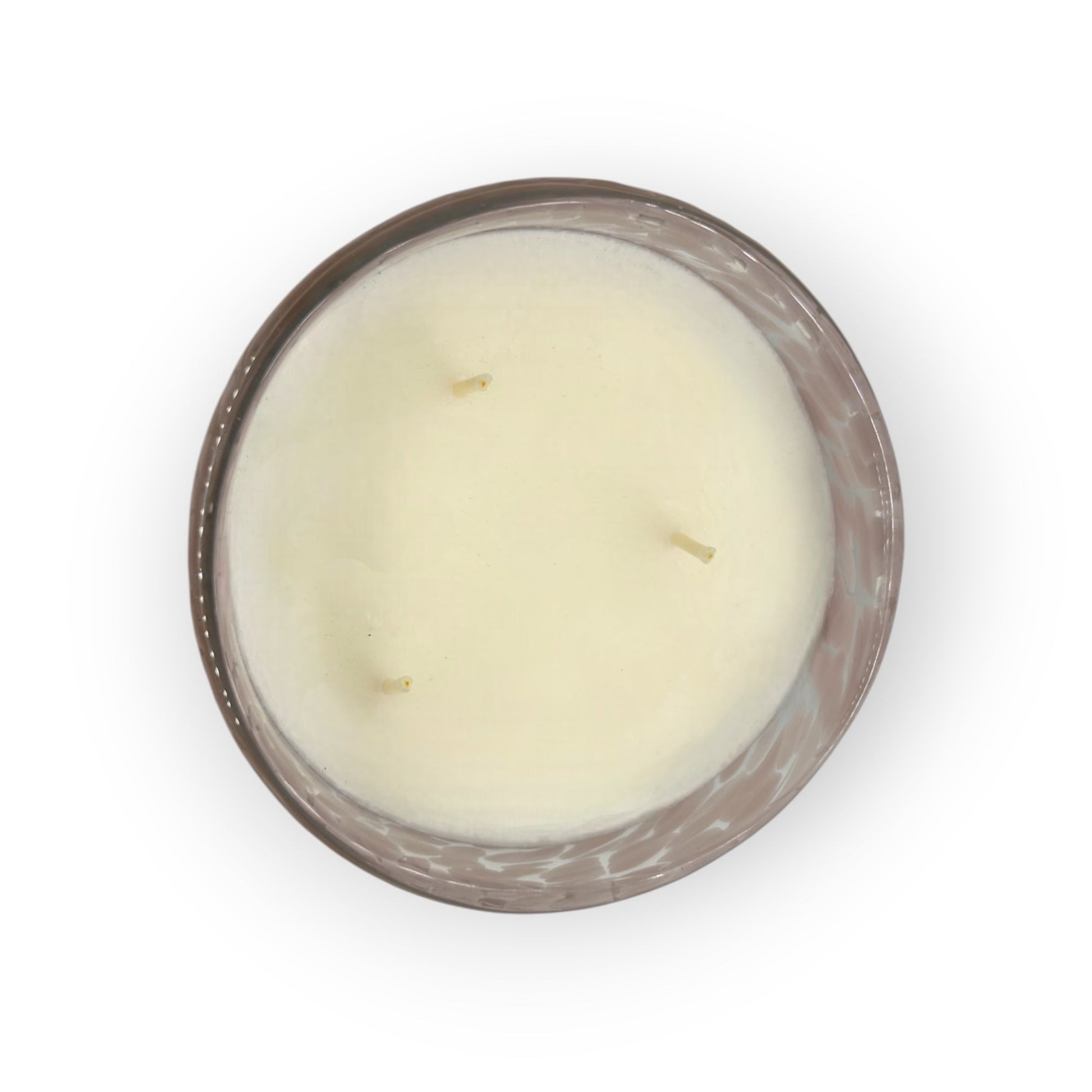 Candle in a glass jar with a decorative lid on a white background